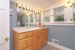 Upstairs bathroom with a shower tub combo